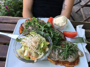 Platski with mushroom sauce and coleslaw.  at Vege Miasto in Warsaw