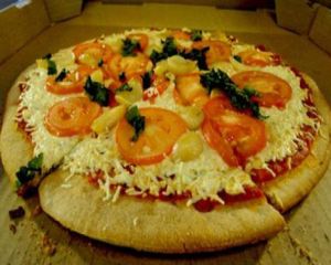 12 inch vegan pizza with daiya, tomato, basil and fresh garlic at Whole Foods Market - Las Vegas Blvd in Las Vegas