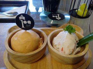 thai tea and orange tomato something  at Iconic Ice Cream in Chiang Mai
