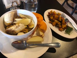 Granola bowl w/side of sweet potato home fries  at The Booch Bar in Hilo