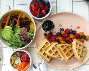 Waffles and breakfast bowl  at The Rose Establishment in Salt Lake City