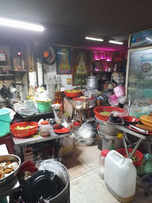 Busy kitchen. Packed full with stuff at Quán chay Cát tường in Thành Phố Hồ Chí Minh