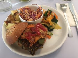 Delicious burger with tempah bacon. 
So delicious with their home made buns.  at Hobbes in Paris