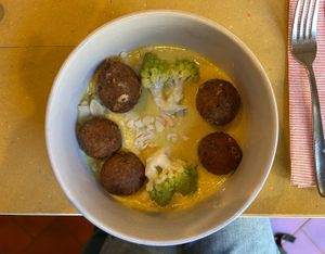 Seitan meatballs with coconut and curry sauce   at Lo Fai in Piacenza