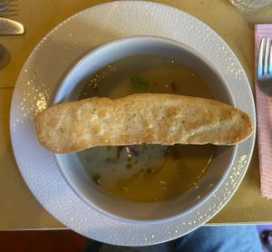 Chestnuts soup with black truffle and vegan bacon  at Lo Fai in Piacenza