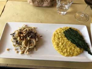 They kindly allowed us 2 half portions on one plate: savoury strudel with roasted veg & chestnut & pumpkin risotto. at Lo Fai in Piacenza