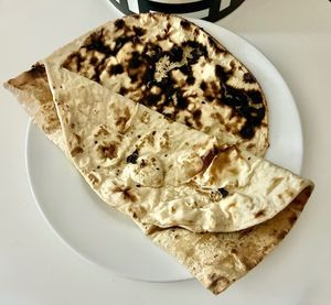 Wholemeal naan at Poppadom Indian Takeaway in دبي