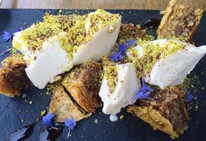 Baklava. Vanilla Ice Cream. Pomegranate Molasses. Pistachio. Mint. Sumac. Vegan/Gluten Free  at Mesa Verde in Santa Barbara