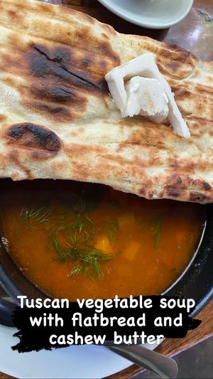 Cashew butter was served with the bread. The flatbread was bland. Could have used salt. A sourdough would have been perfect. The soup was really tasty, but $18? Whew!  at Mesa Verde in Santa Barbara