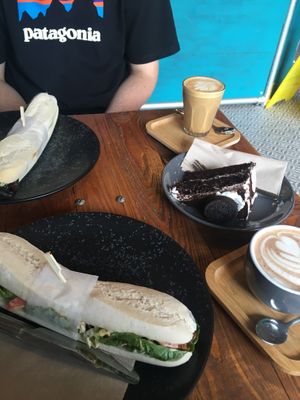 BBQ teriyaki tempeh sandwiches, a flat white, mocha and Oreo cake  at Power Plant Cafe in Plymouth