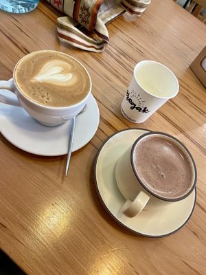 Hot chocolate and cappuccino, both with banana milk 10/10  at Aregak Bakery and Café in Shirak Province