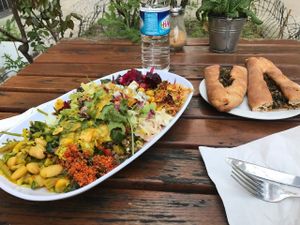 Large salad plate with calzone at Kiez Vegan - Kortestrasse in Berlin
