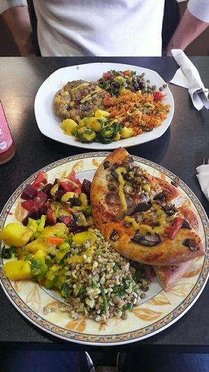 Salads and pizza at Kiez Vegan - Kortestrasse in Berlin