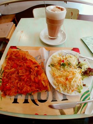 Pizza, various salads and a hot chocolate. at Kiez Vegan - Kortestrasse in Berlin