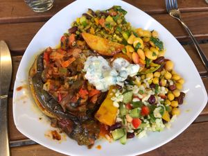 4 salads and filled aubergine. Good taste and nice portionsize. at Kiez Vegan - Kortestrasse in Berlin