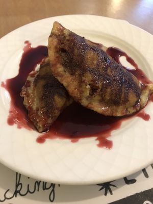 The vegan dessert option was filled with fruit, coconut, and nuts with a delicious syrup.  at Malak in Santiago De Compostela