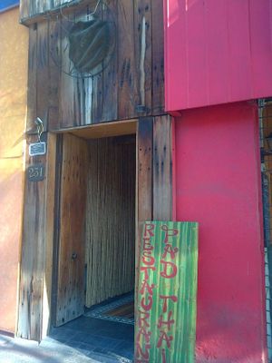 Bit of a hidden gem and easy to miss, look for this sign. at Pad Thai in Santiago