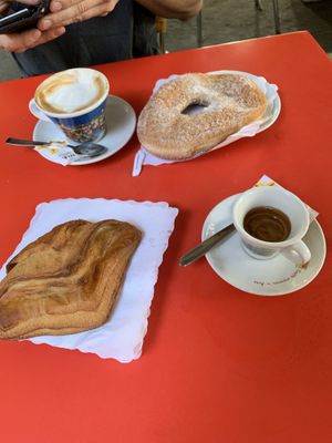 Vegan donut, apple filled pastry and coffee at Caffe Trastevere in Rome