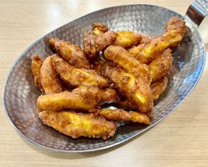 Spicy battered chips  at Bob's Fish & Chips in دبي
