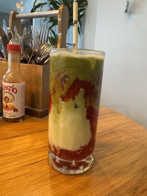 iced oat strawberry matcha   at Avodi Vegetarian & Cafe in Auckland