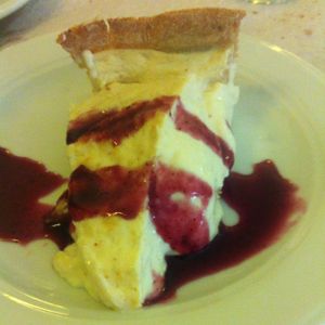 Curd cake with berries sauce at L'Union in Leon