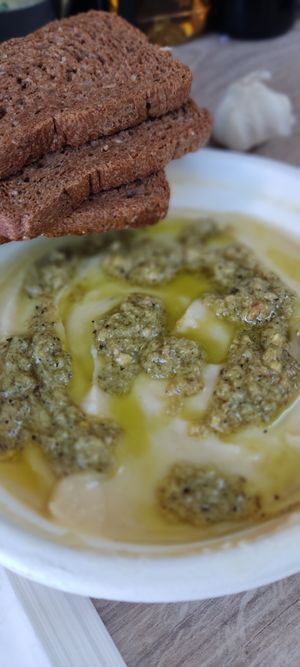 Bean houmous with confit garlic & halapenio topping   at Experimental station rainbow 12 in Bansko