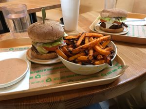 Signature burger with baked sweet potato fries, fry sauce, & bleu BBQ burger at Next Level Burger in Bend