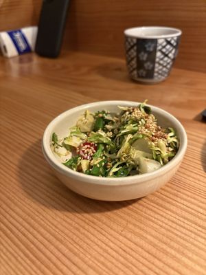 Tasty salad with Brussels sprouts   at Slurp Ramen Joint in København