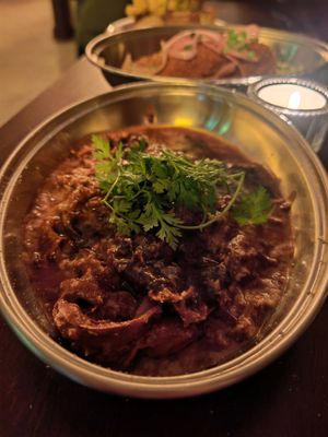 Shredded beef in red wine, confit fillet, shallots, gondino and chervil, my favorite dish, with an amazing texture and taste. We finished the plate with the delicious sauce! at Présent in Paris