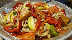 Garlic stir fried noodles ($15). Decent, but slightly sweet. Tofu is $3 extra. Get the Lanzhou stir fry instead. at Meet up noodle - 碰个面 in Minneapolis