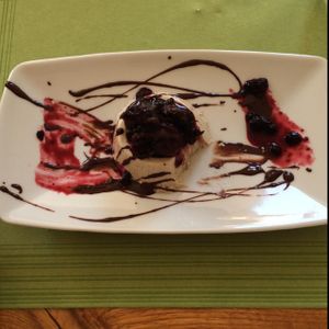 Panna cotta dessert with strawberry and chocolate at NaturaSi in Catania