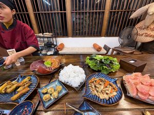 Spring rolls, banana leaf salad, stuffed mushrooms, vermicelli rice noodles, greens, stir fry veggies and pomelo  at Rose Kitchen in Hà Nội