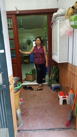 Tiny place looks like this woman's personal kitchen. at Au Lac - Duong Lang in Hanoi