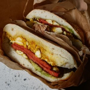 Vegan intifada kaak bagel with scrambled tofu, avo, facon at 1947 in Boronia