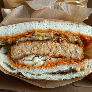 Vegan chicken schnitzel, cheese, tomato pesto, lettuce! at 1947 in Boronia