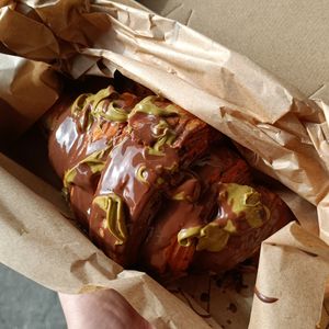 Vegan pistachio choc croissant stuffed with pistachio butter - desserty at 1947 in Boronia