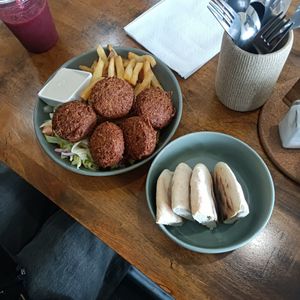 Falafel bowl (absolutely delish crispy falafel) with fries, veggie yoghurt sauce, salad, chips, fresh soft pita at 1947 in Boronia