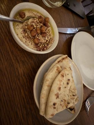 Vegan hummus and pita bread  at Meraki Greek Restaurant & Bar in London