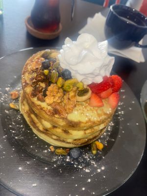 Pistachio pancakes with added cream   at Rinconcito Vegano in Bayamon