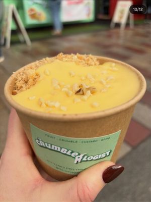 A pot of warm fruit Crumble and Custard at The Crumbleologist ltd in Glasgow