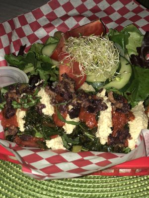 Lasagna and a side salad  at Rawtopian Bliss Cafe in Columbia