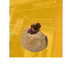 Falafel, superposed above pic of one of the entrances to the underground food court. at Falafel Plant in New York City