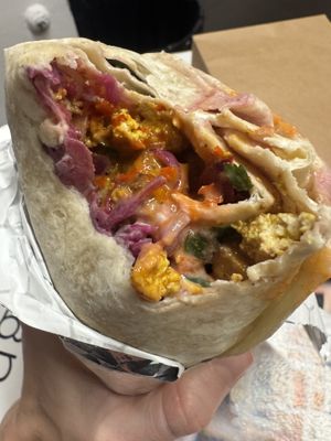 Tofu shawarma wrap with harissa  at Falafel Plant in New York City