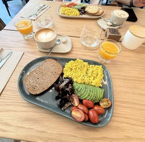 Desayuno completo switching egg to tofu. Includes coffee and juice. Asked for gluten free bread with no extra cost.  at Koala in Buenos Aires