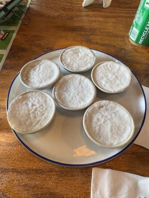 Thai custard (made from Coconut). Top layer is soft & pillowy. Bottom layer is heavier & sweet. Very yummy.  at SENYAI Thai Street Food & Noodle Bar in Jacksonville