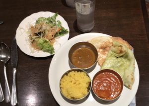 Salad with sesame dressing, tomato and black beans curry, rice and vegetarian and vegan naans at Nataraj - Ginza in Tokyo