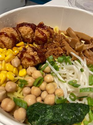 Topping of the ramen: sweet corn, chickpeas, marinated bamboo, fried tofu, spinach, soy sprouts  at Top Ramen in Lombardia