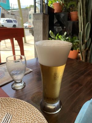 Beautiful pic of local Peruvian beer Cusquena at Chifa La Familia Feliz in La Fortuna