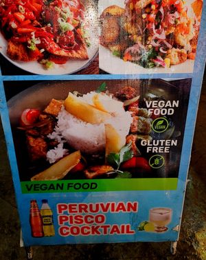 Sign outside at Chifa La Familia Feliz in La Fortuna