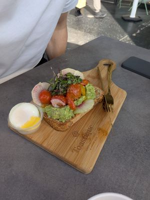Avocado toast (with added non-vegan poached egg) at Toastique in Los Angeles